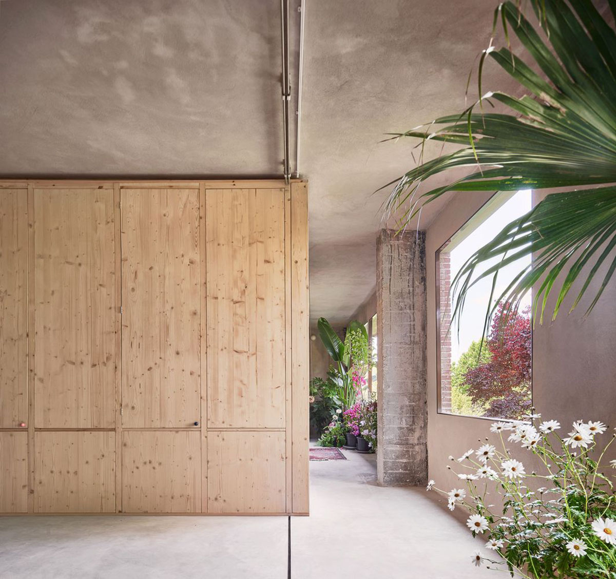 Takk renovates interior of a house in Madrid with wood and natural cork for energy efficiency