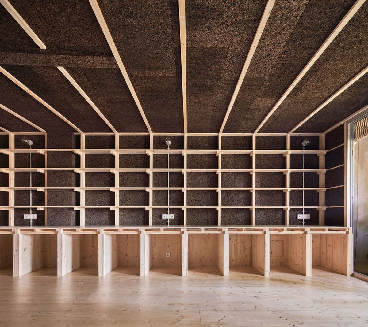 Takk renovates interior of a house in Madrid with wood and natural cork for energy efficiency