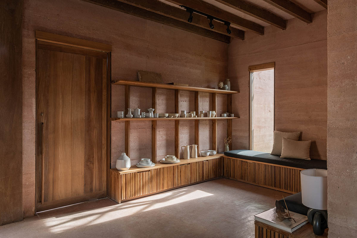 Blancostudio wraps pottery shop with rammed-earth walls with zen garden in Ubud 