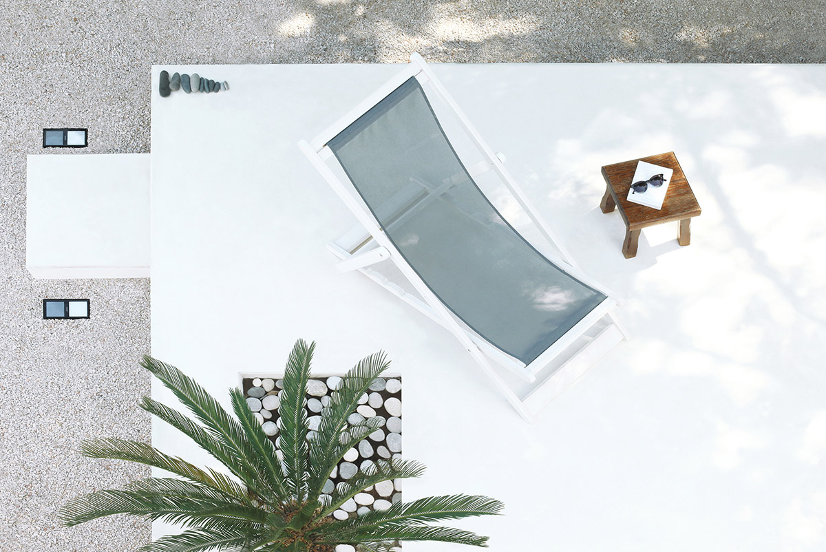 Mandalaki Studio completes minimalist prefabricated holiday house in Greece