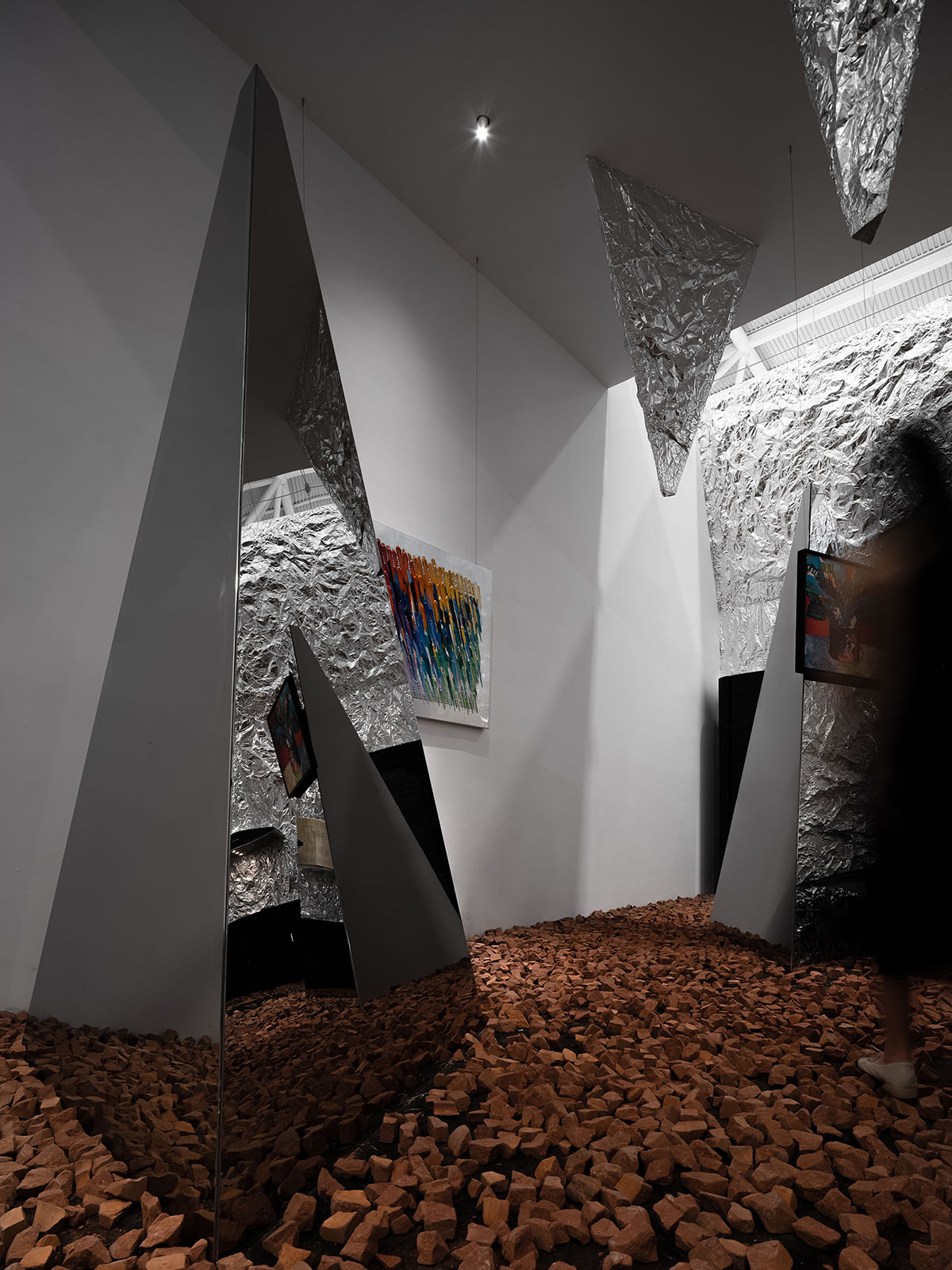 AD ARCHITECTURE creates metallic interiors for Mirror Gallery exhibition space in Shenzhen