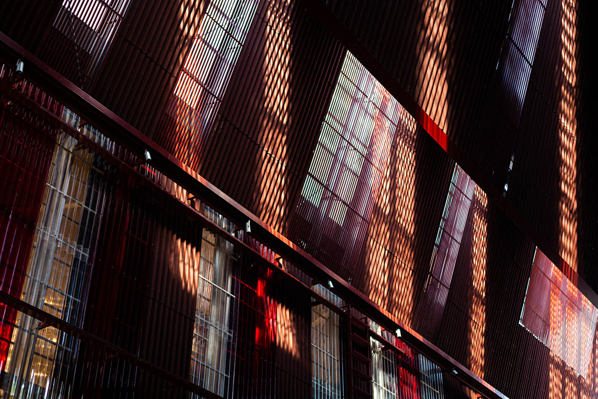 Department of ARCHITECTURE built pavilion with red transparent corrugated sheets for its roof