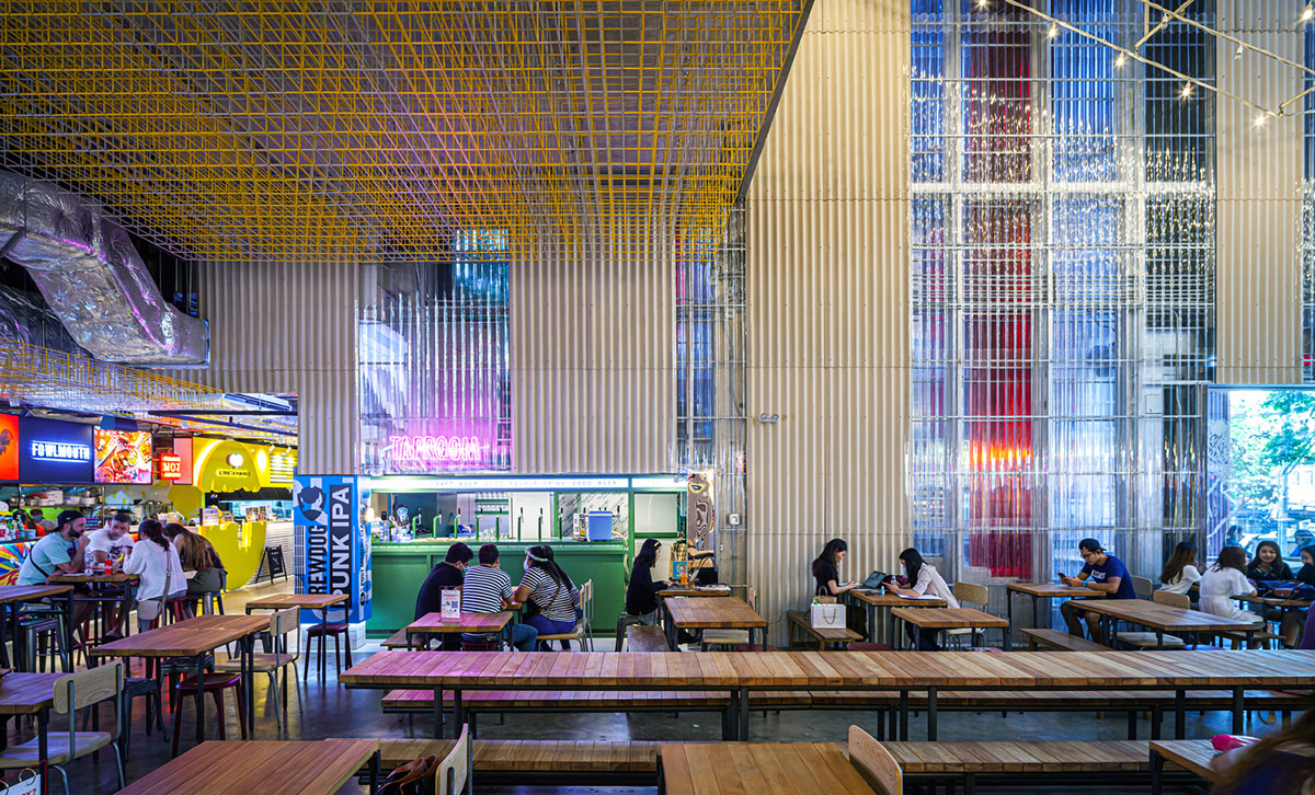 Department of ARCHITECTURE built pavilion with red transparent corrugated sheets for its roof