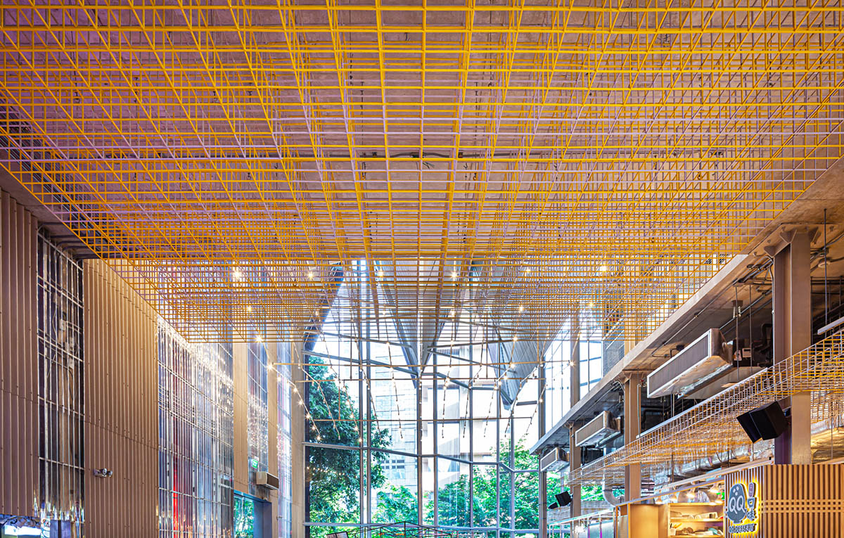 Department of ARCHITECTURE built pavilion with red transparent corrugated sheets for its roof