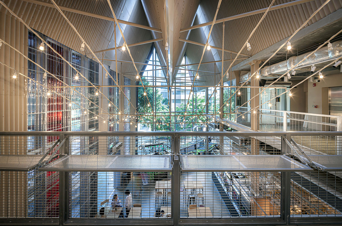 Department of ARCHITECTURE built pavilion with red transparent corrugated sheets for its roof