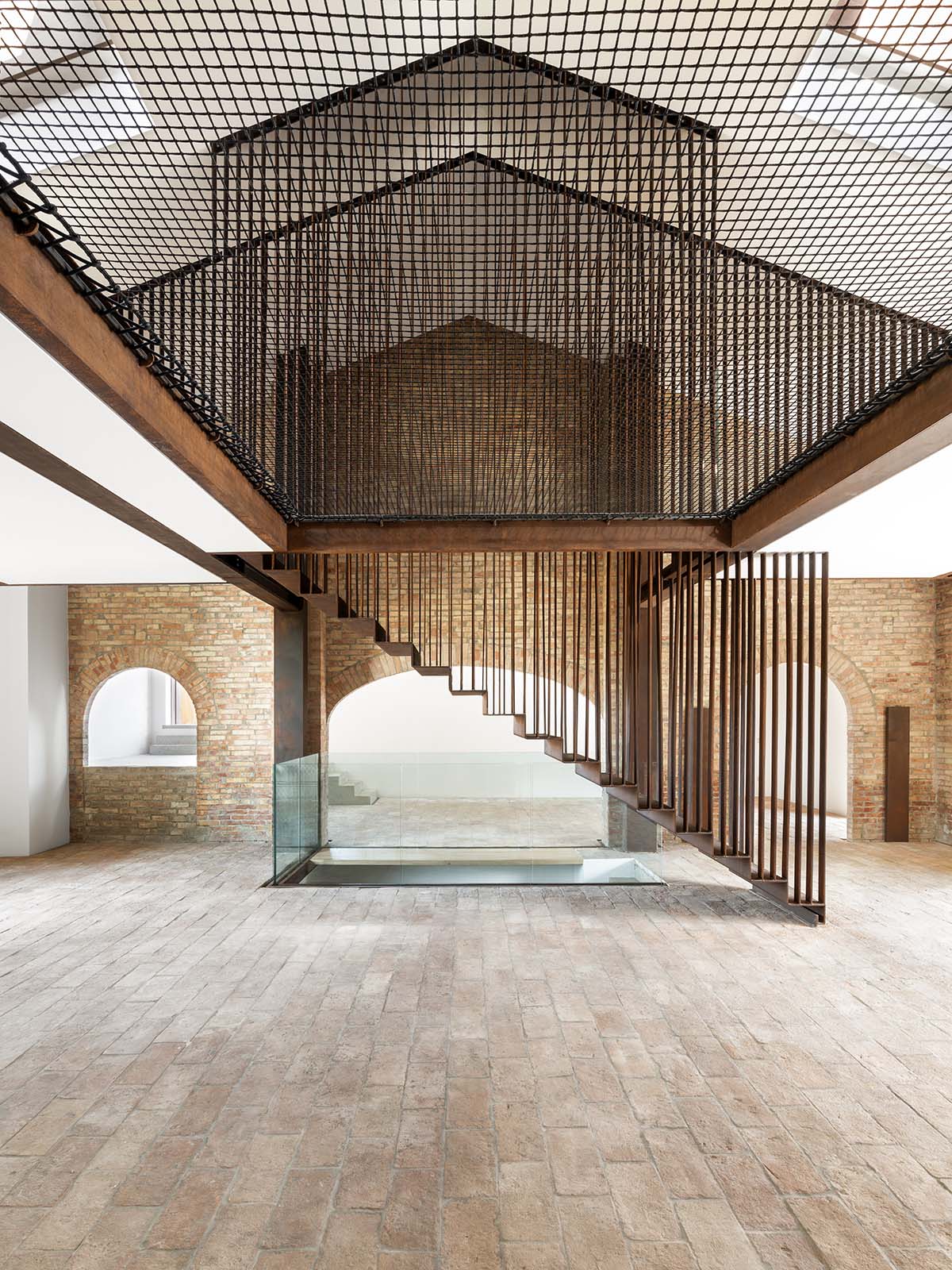 Carlo Ratti Associati completes private house around ten-meter-tall ficus tree in Italy