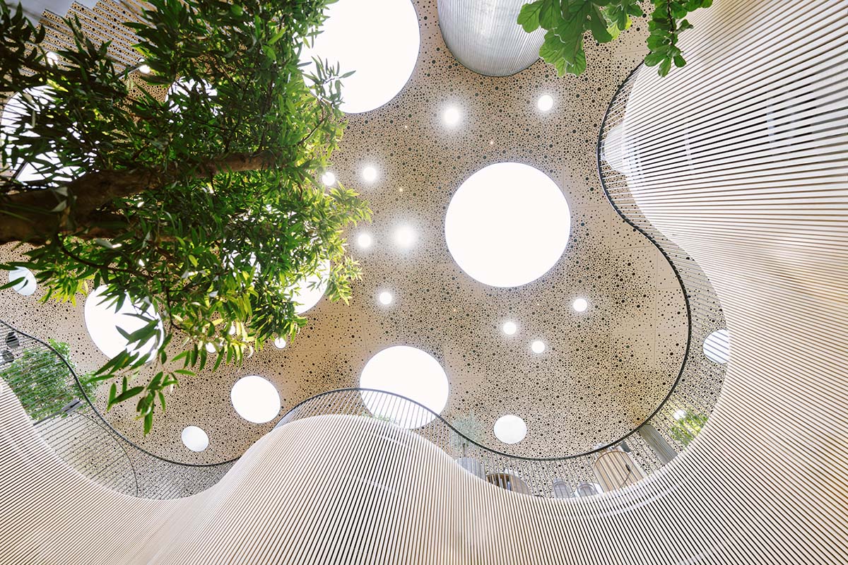 Cobe unveils The Opera Park with flower-shaped greenhouse and atrium in Copenhagen's inner harbor