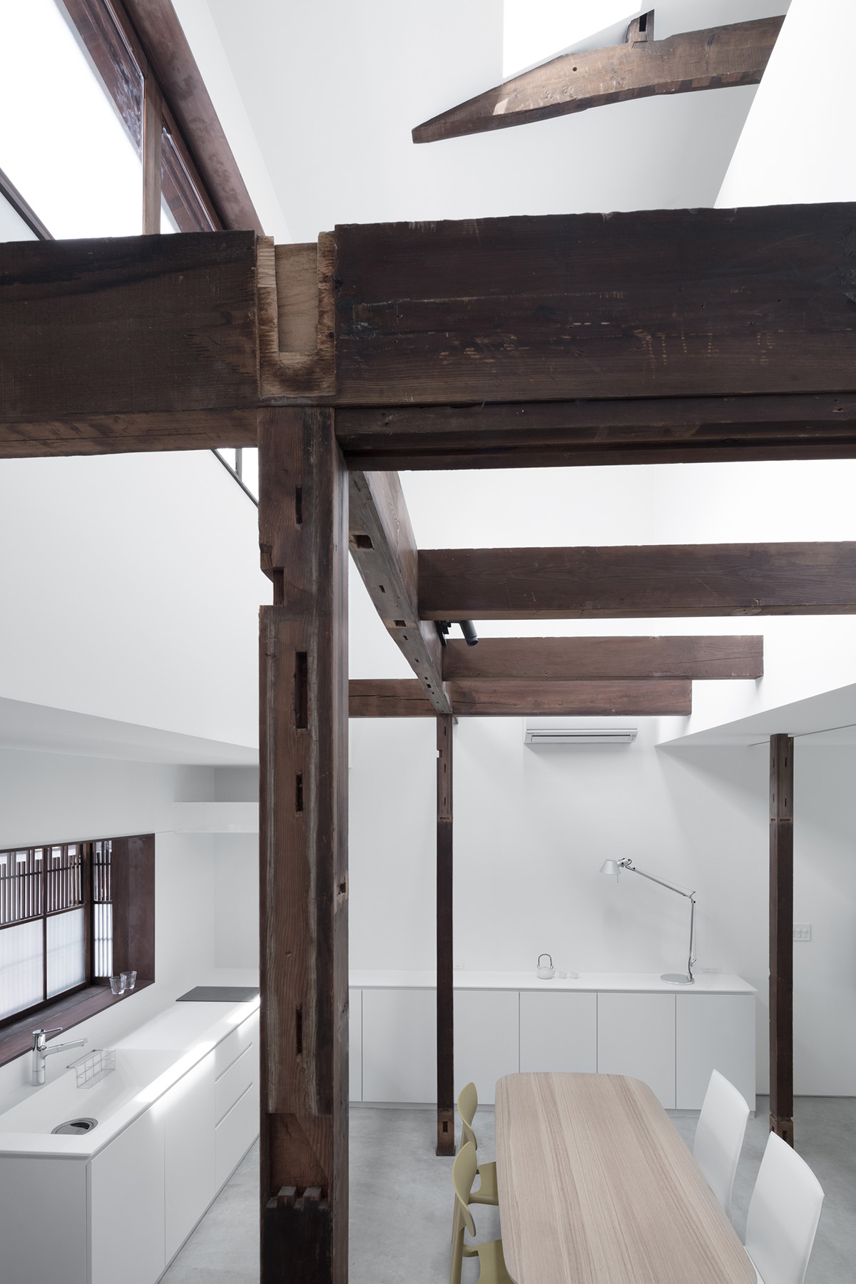 kooo architects renovates traditional Japanese machiya house with light interiors in Kyoto, Japan