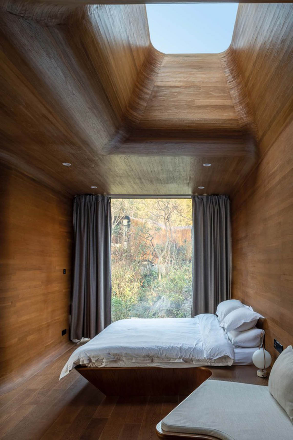 Four rounded spring huts by MONOARCHI disappear in Nanjing's woods 