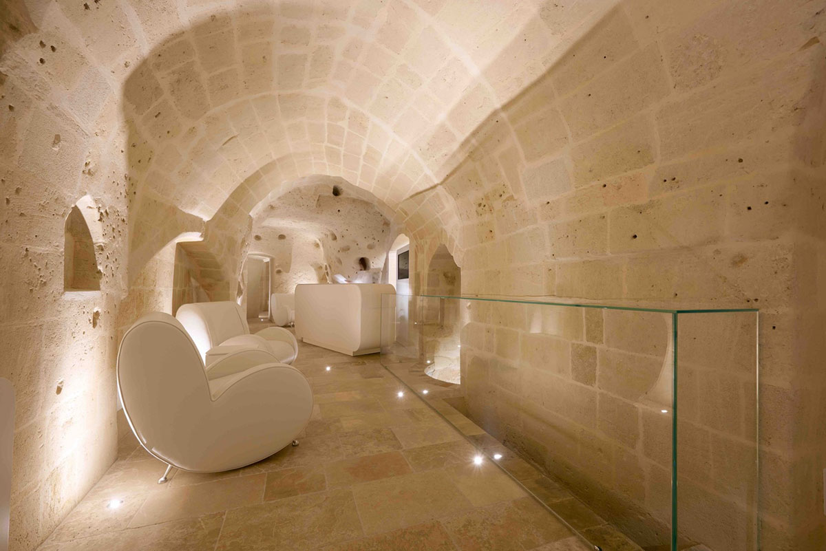 Interiors of this cave hotel and spa by Simone Micheli act like work of art with excavated surfaces