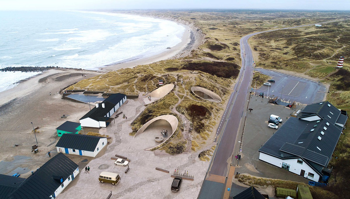 Dorte Mandrup hides Thy National Park Center under sand dunes with big rabbit holes in Denmark