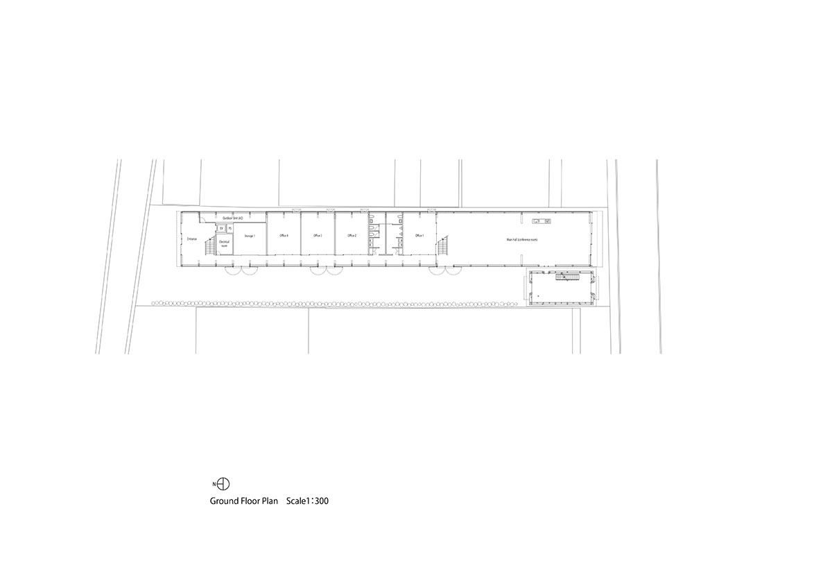 Tezuka Architects' zig zag office building creates lace-like façade with wooden diagonal grids