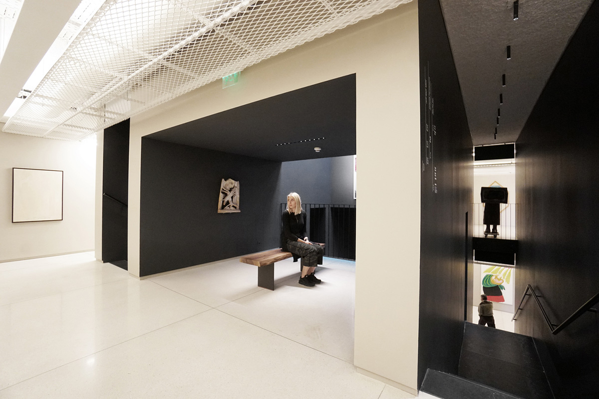 YTAA converts old villa into a museum with irregular dark surfaces and glazed base in Bucharest