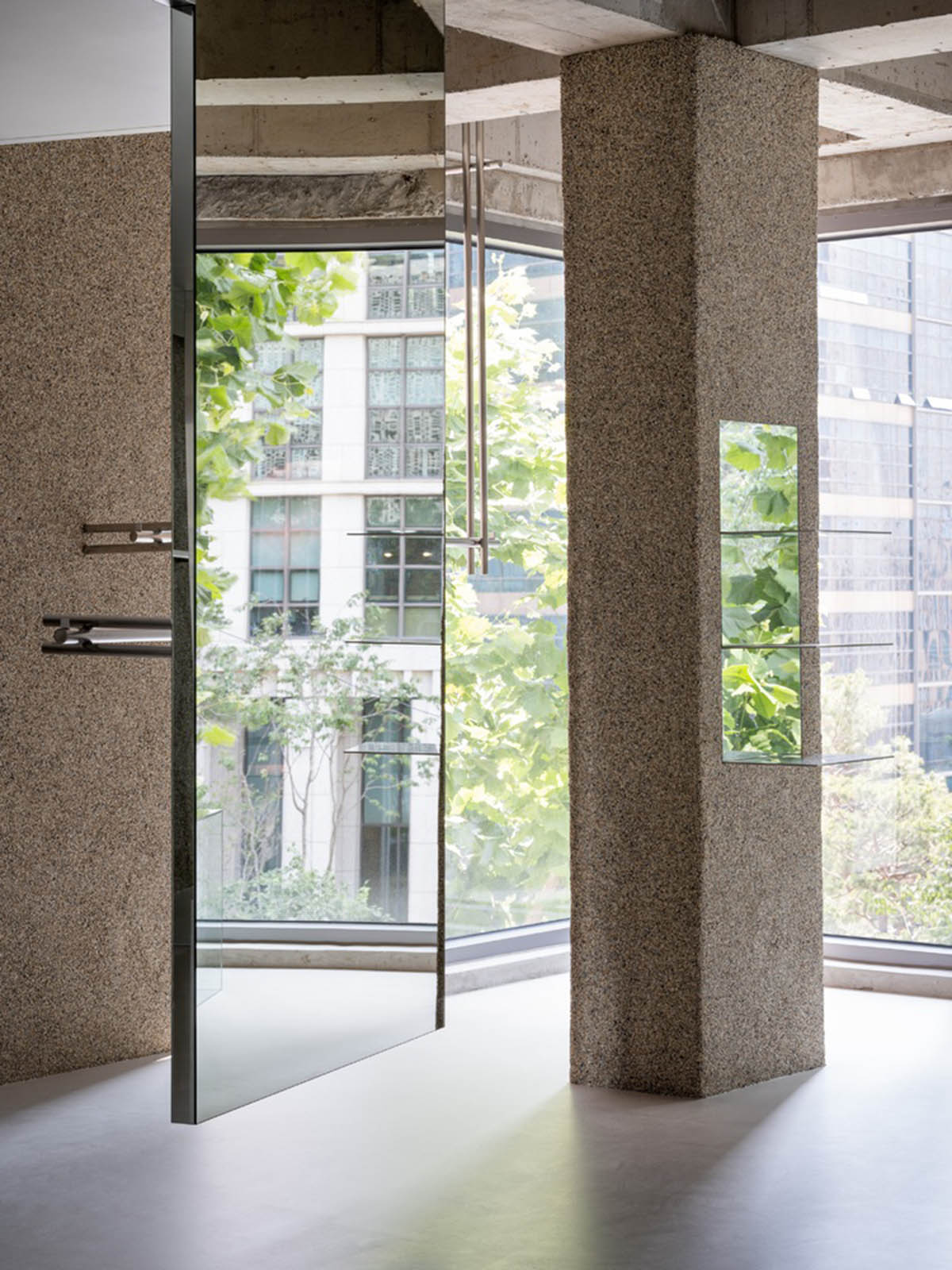 Warm colors are harmonized with floating linear elements in Towpath Shop by Studio GIMGEOSIL