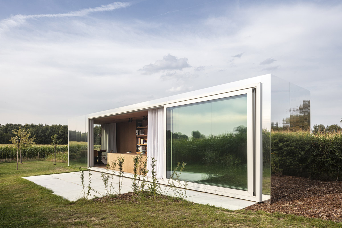 TOOP architectuur uses old shipping containers to convert them into architects' studio in Belgium