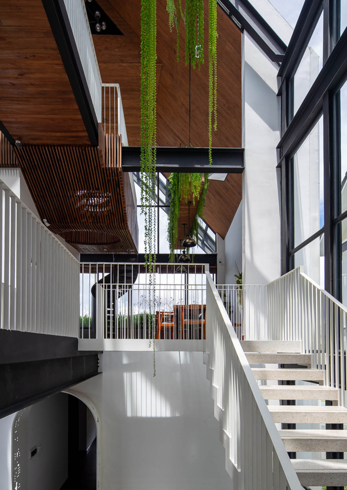 Le House wraps this small hotel with porous steel facade made of irregular patterns in Vietnam