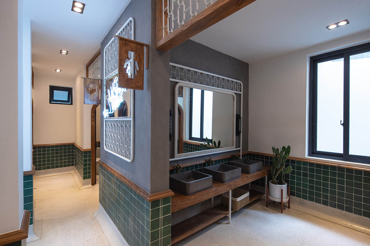 Le House wraps this small hotel with porous steel facade made of irregular patterns in Vietnam