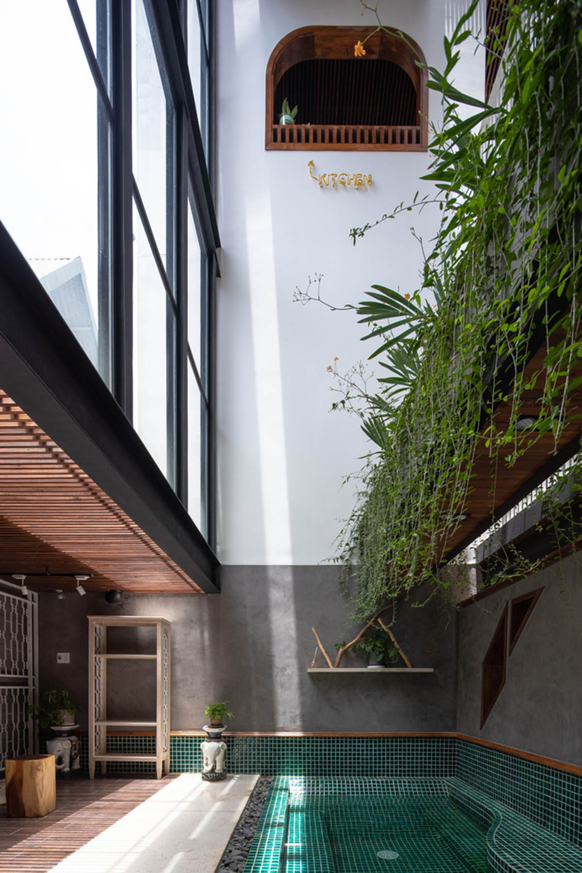 Le House wraps this small hotel with porous steel facade made of irregular patterns in Vietnam