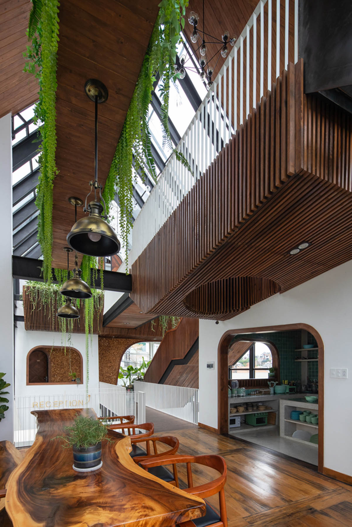 Le House wraps this small hotel with porous steel facade made of irregular patterns in Vietnam