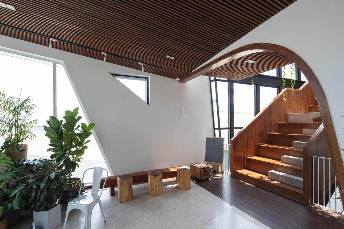 Le House wraps this small hotel with porous steel facade made of irregular patterns in Vietnam