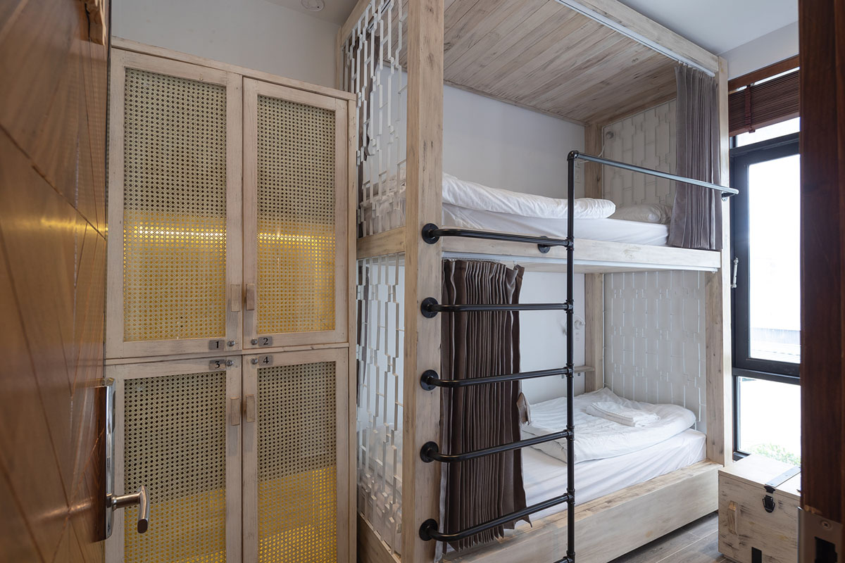 Le House wraps this small hotel with porous steel facade made of irregular patterns in Vietnam