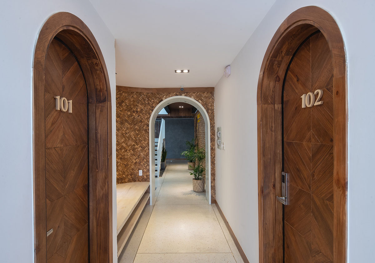 Le House wraps this small hotel with porous steel facade made of irregular patterns in Vietnam