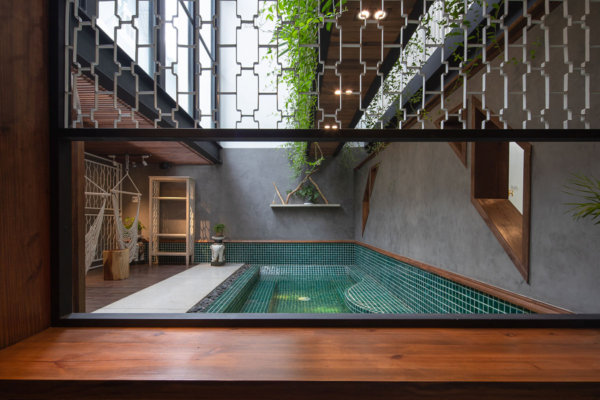 Le House wraps this small hotel with porous steel facade made of irregular patterns in Vietnam