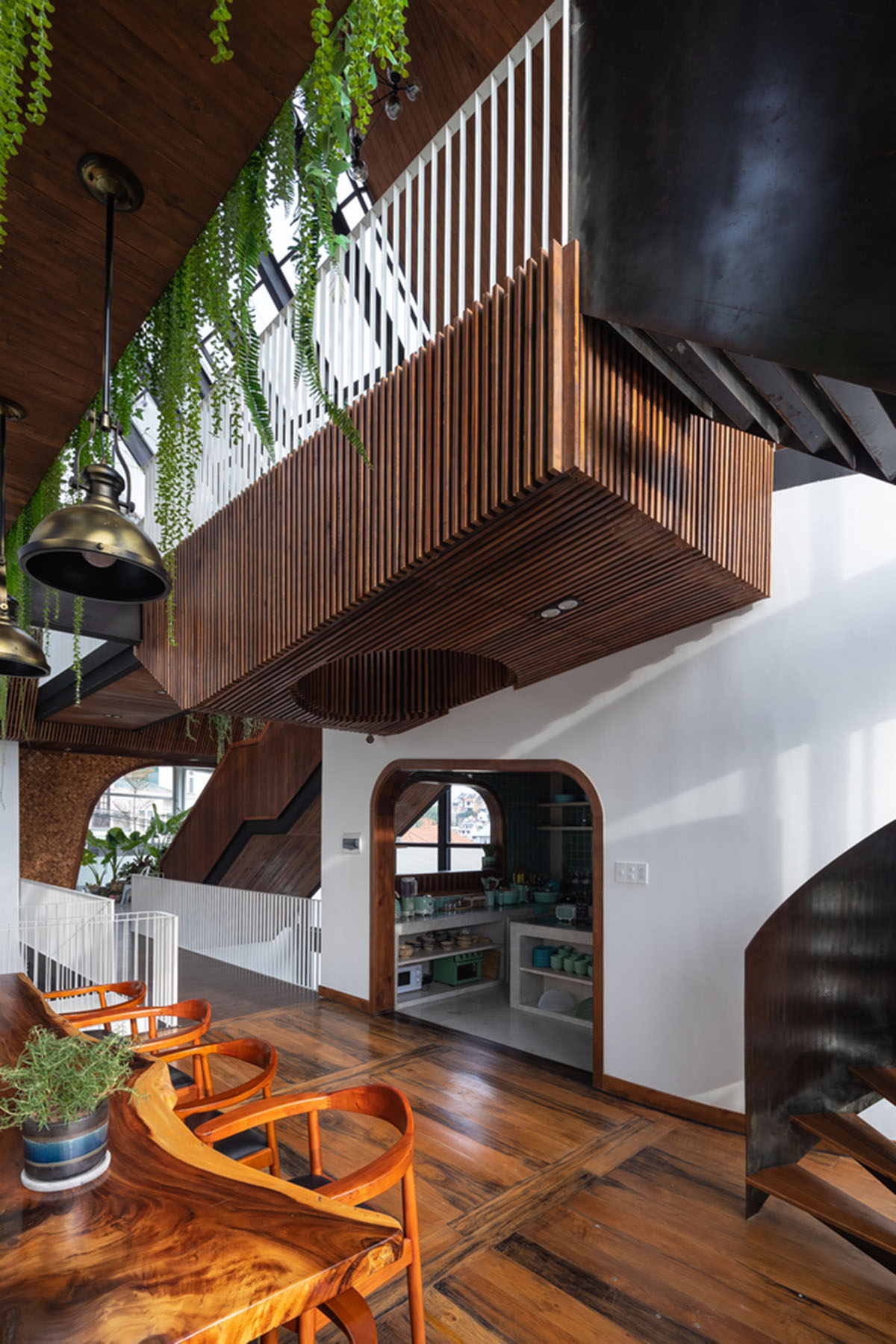 Le House wraps this small hotel with porous steel facade made of irregular patterns in Vietnam