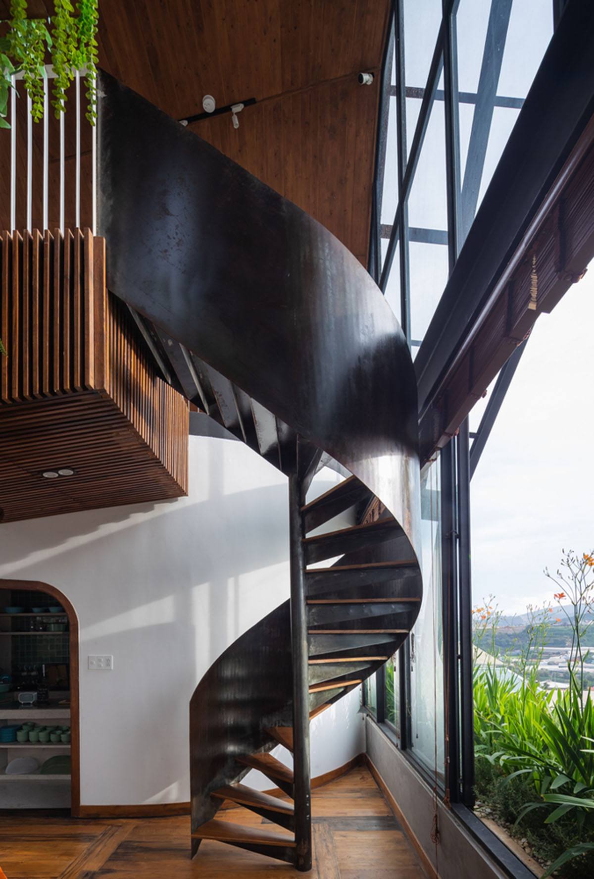 Le House wraps this small hotel with porous steel facade made of irregular patterns in Vietnam