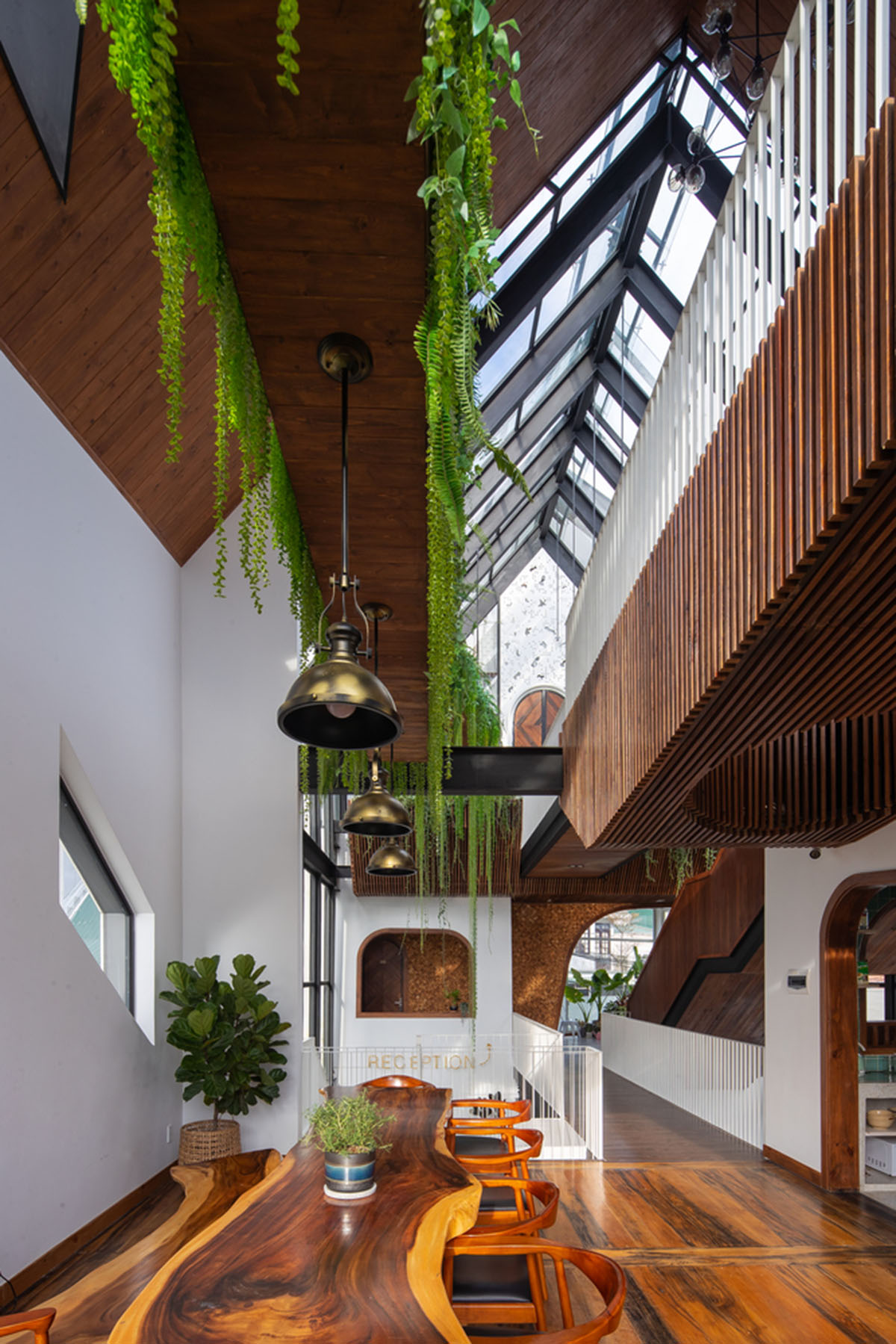 Le House wraps this small hotel with porous steel facade made of irregular patterns in Vietnam