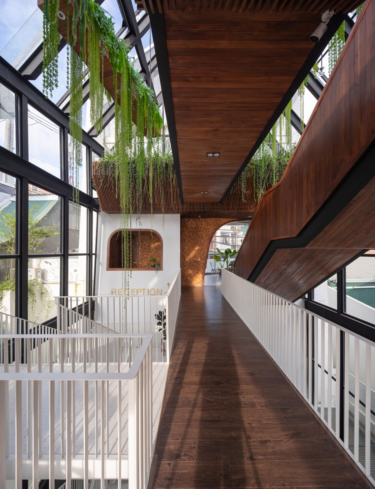 Le House wraps this small hotel with porous steel facade made of irregular patterns in Vietnam
