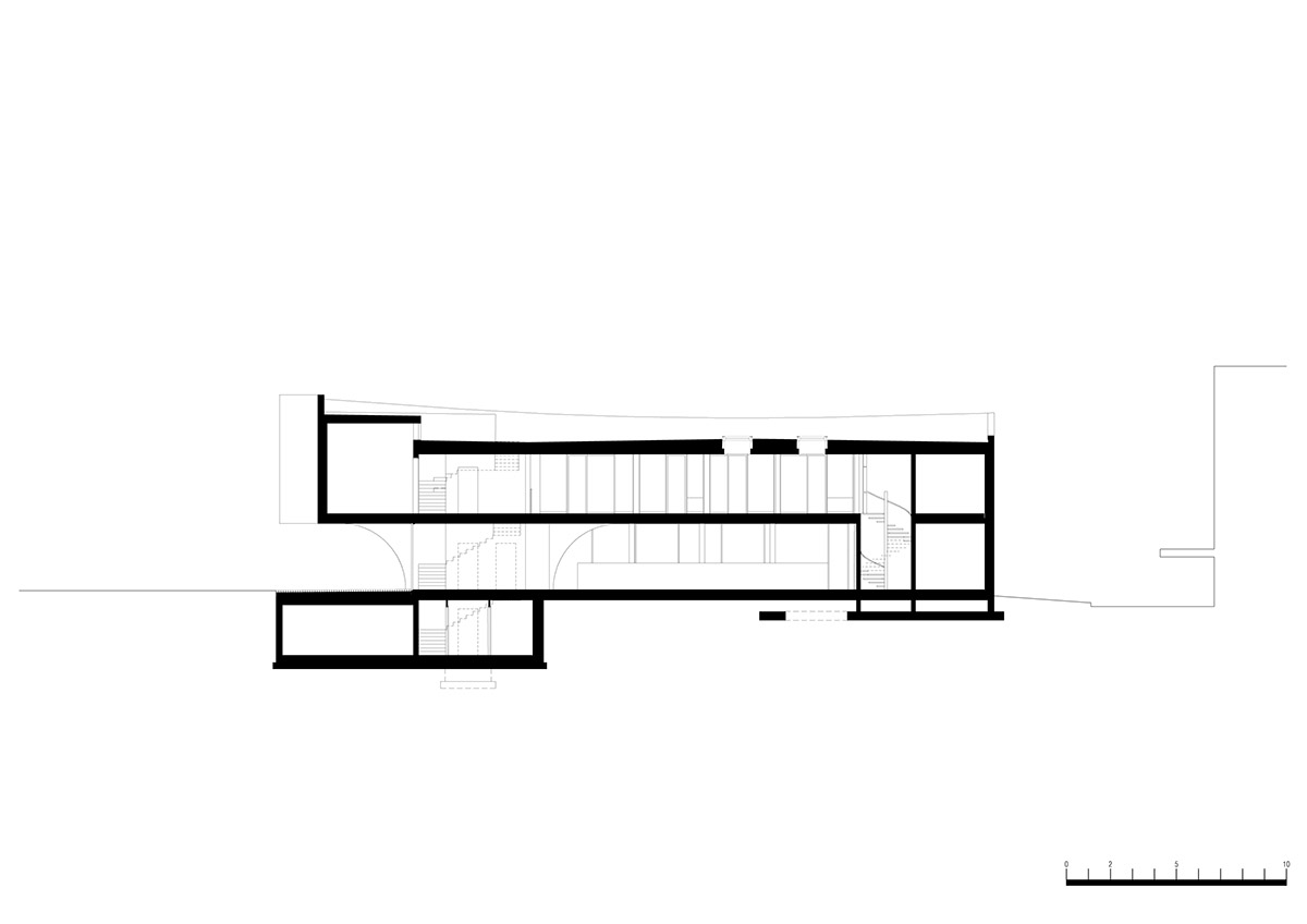 MoDusArchitects wraps public space with sinuous curves for an office building in Bolzano, Italy