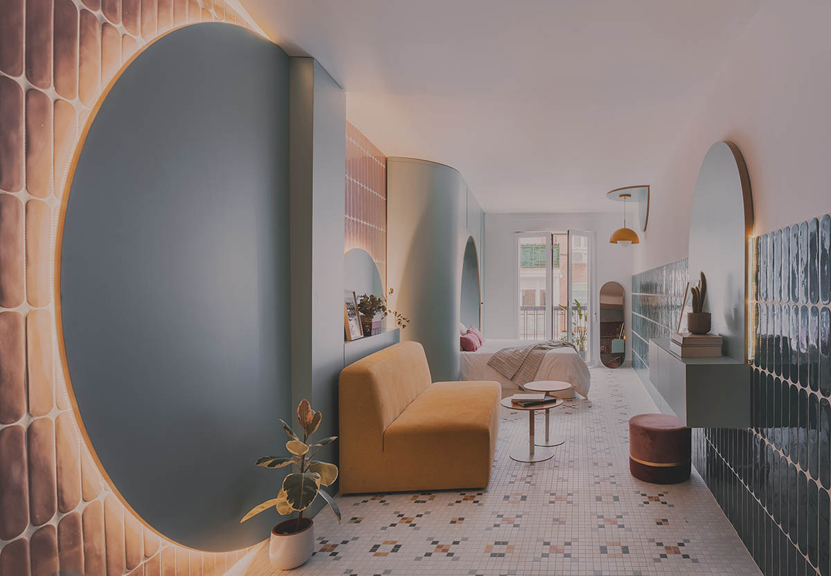 OOIIO transforms an apartment interior into a designer home with flawless ceramic surfaces in Madrid