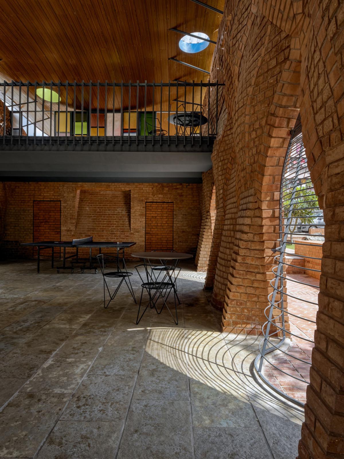 PMA madhushala's community center features undulating and artistic brick walls in Pune