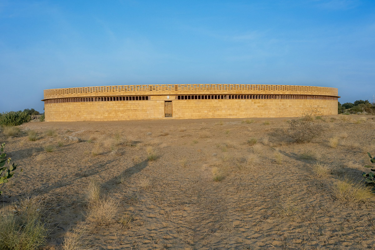 Diana Kellogg Architects' oval-shaped girl's school is made of hand-carved sandstone in rural India