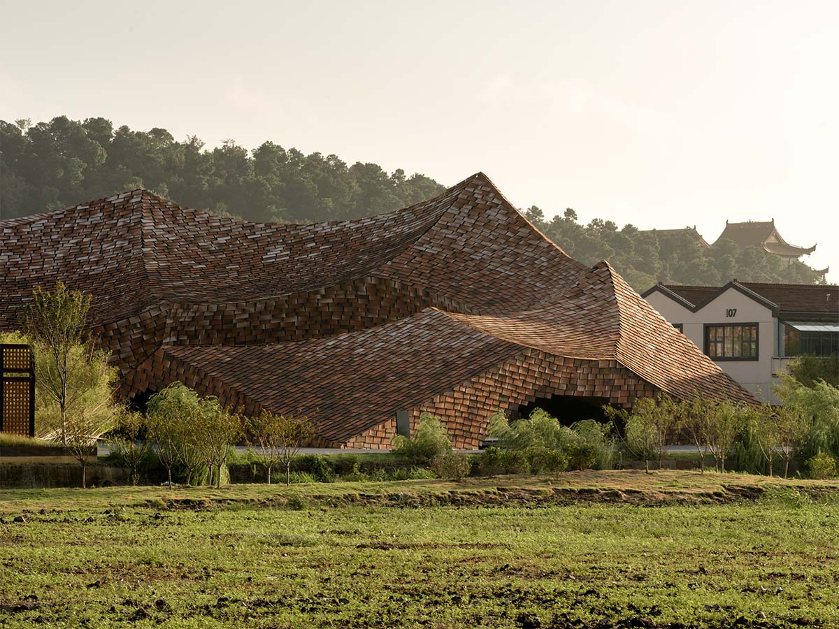 Kengo Kuma & Associates completes clay museum resembling