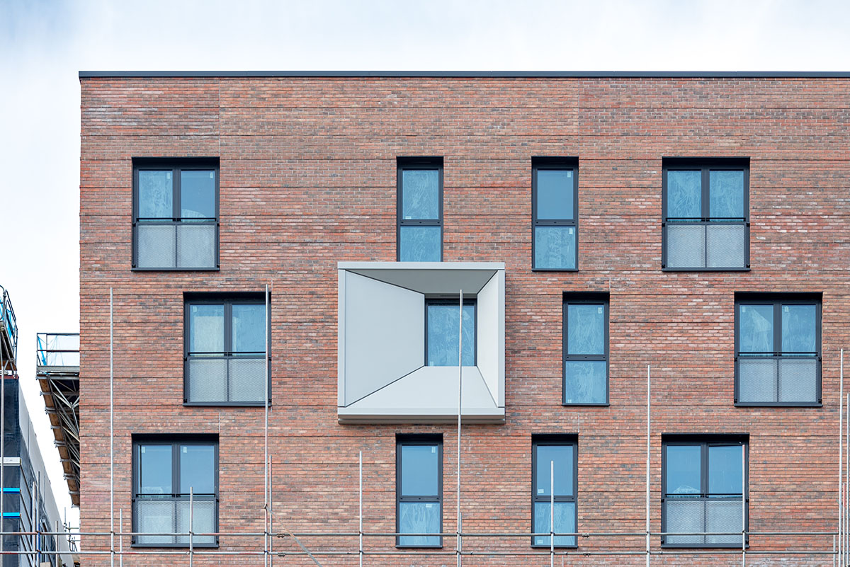 Mecanoo designs residential development as a melting pot in the historic canal street of Manchester