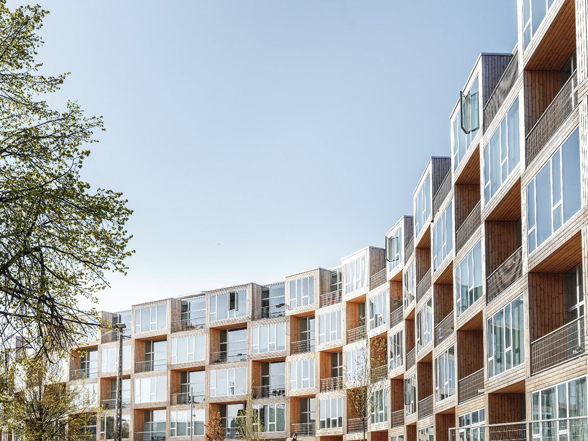 BIG Completes Curvy Affordable Housing For Low-income Families In ...