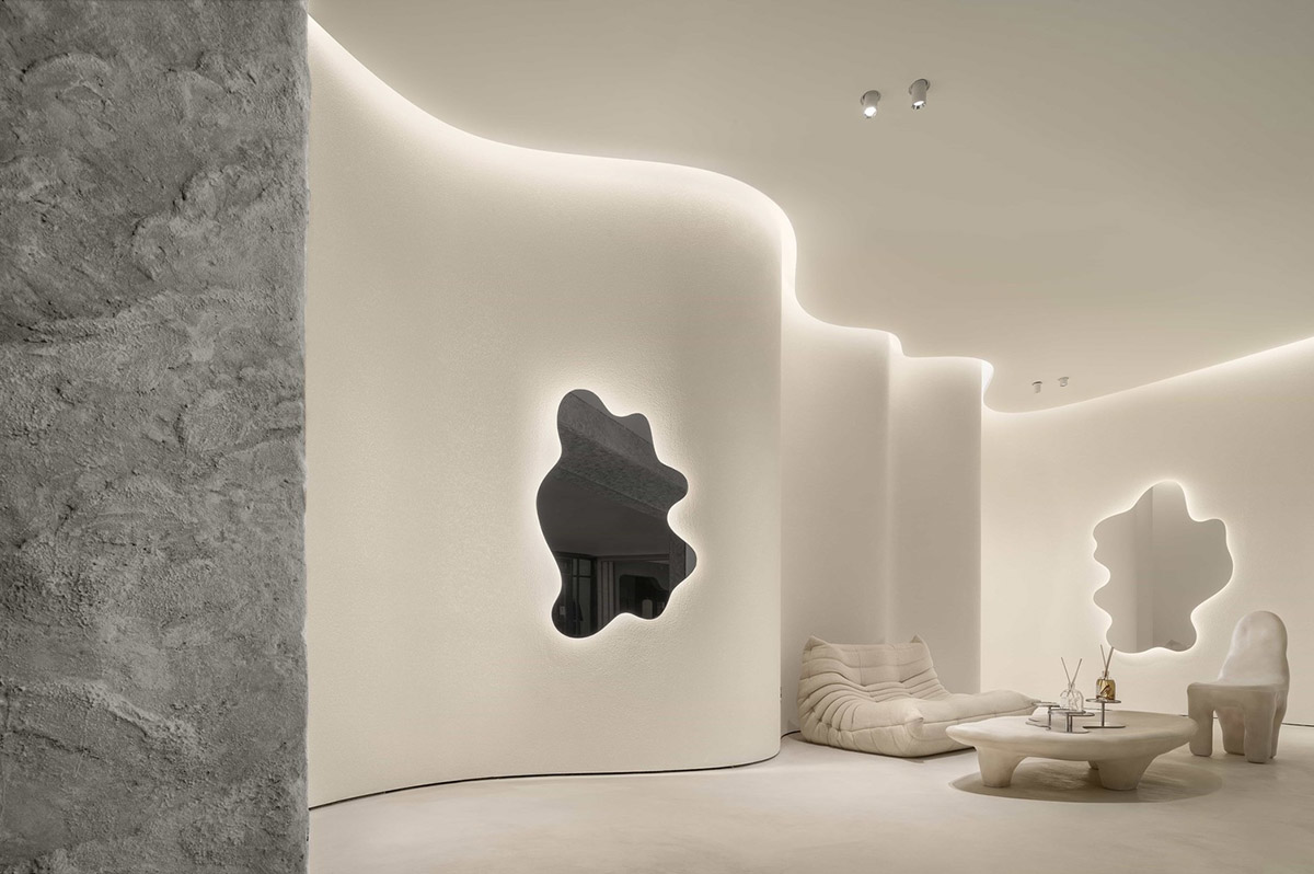F.O.G. Architecture creates cave-like interiors with mirrored surfaces for aromatherapy store