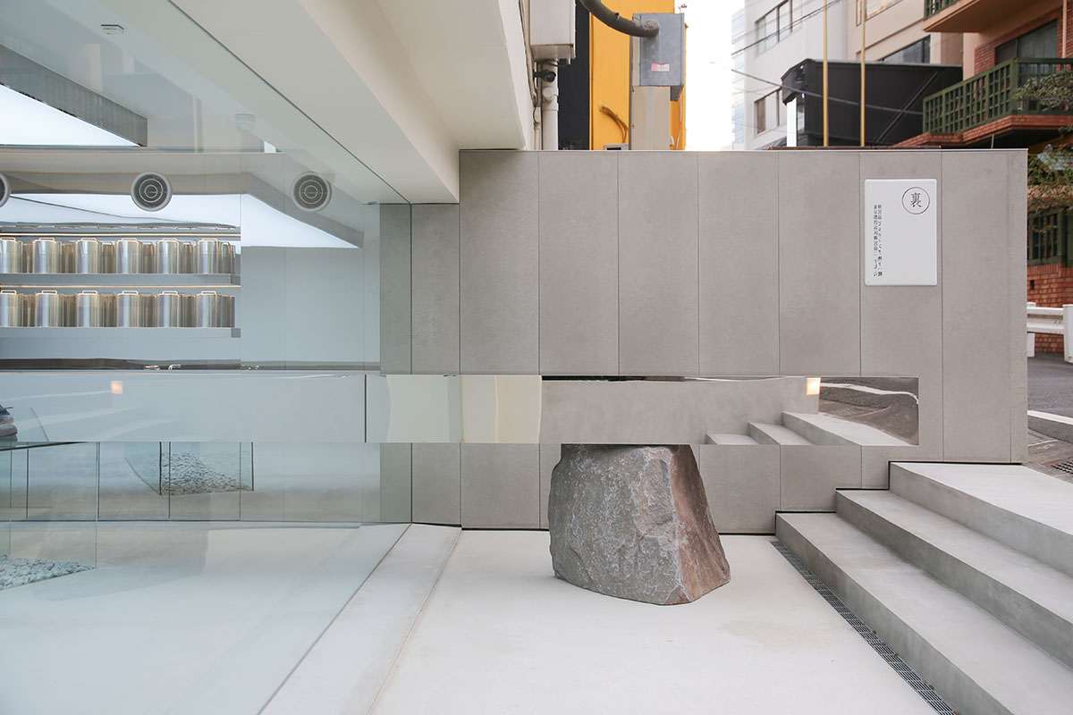 Mirrored boxes and reflective surfaces create multifaceted perspectives in a Tokyo shop