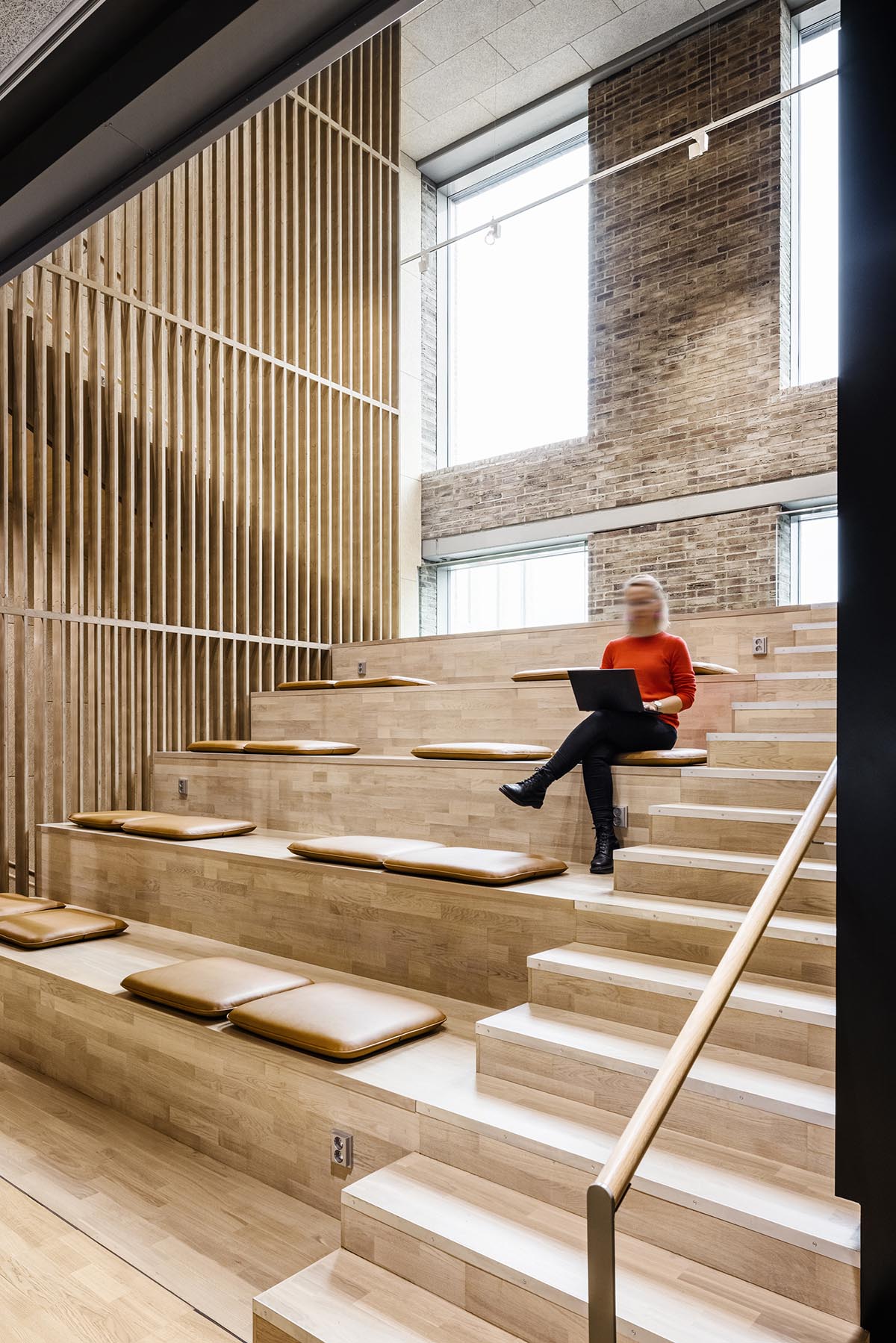 Lahdelma & Mahlamäki architects complete Urban Environment House with brick arcades in Helsinki