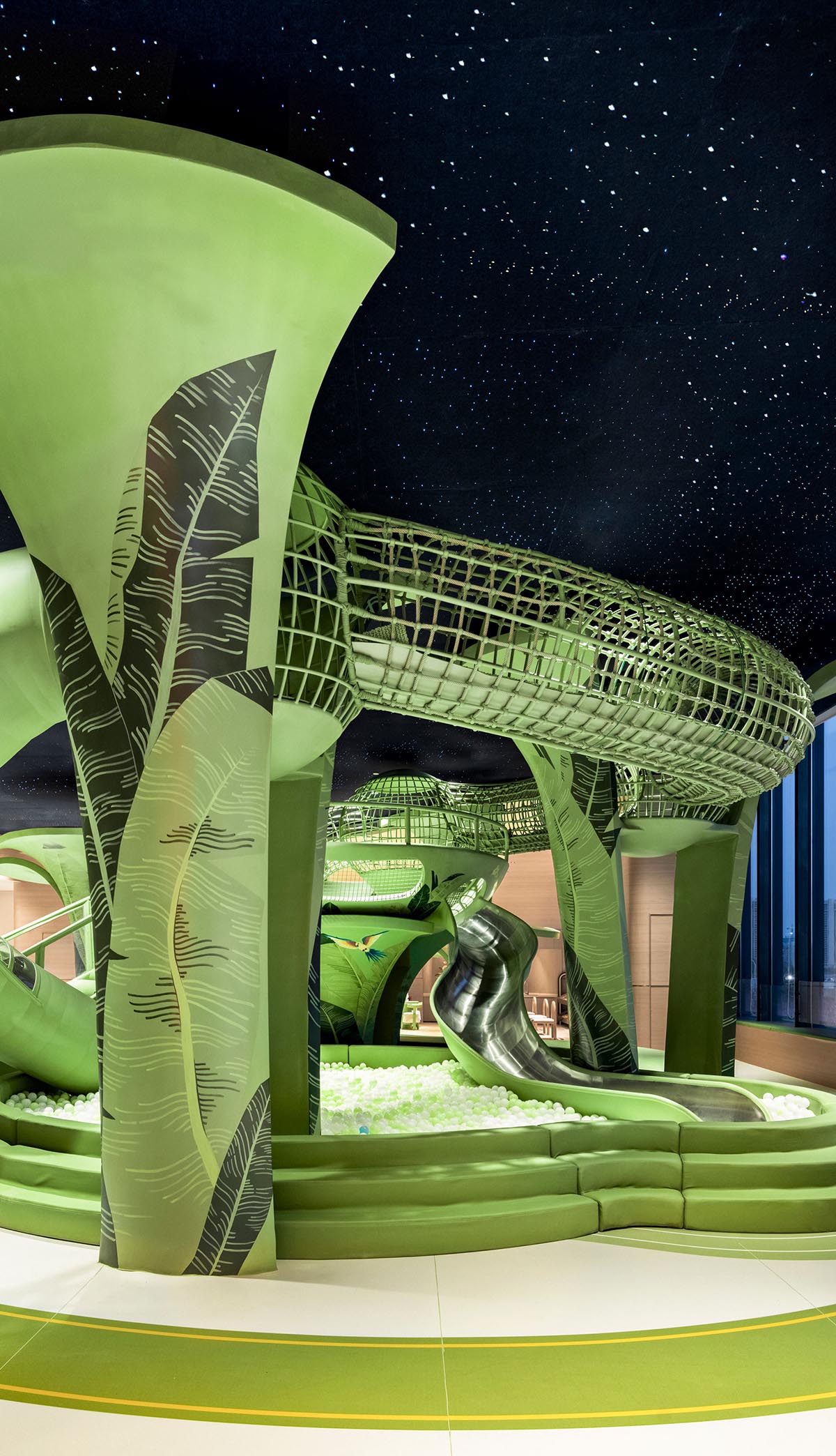 Children's entertainment area by Mind Design mimics green jungle with ...