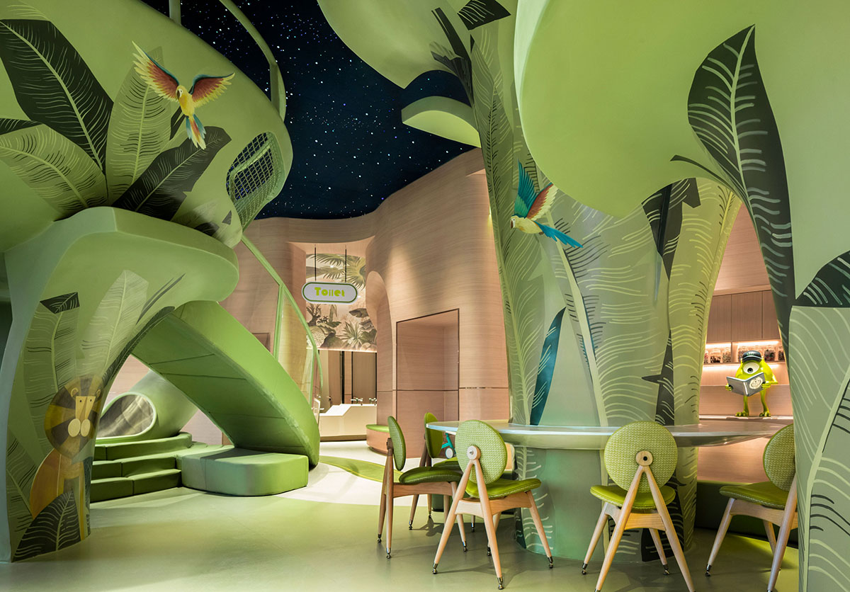 Children's entertainment area by Mind Design mimics green jungle with curvy climbing net in Ningxia 