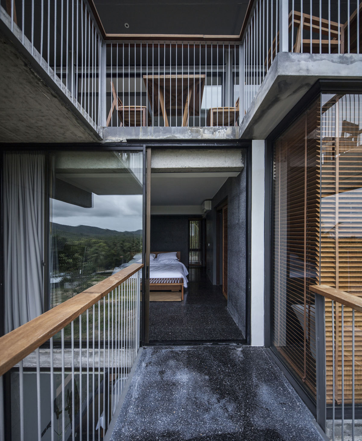 Patchara+ Ornnicha Architecture designs hotel with super elongated balconies on a serene hillside