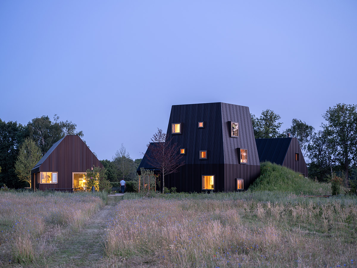 Mecanoo completes Villa Vught with dark bronze cladding inspired by traditional Dutch farmhouses