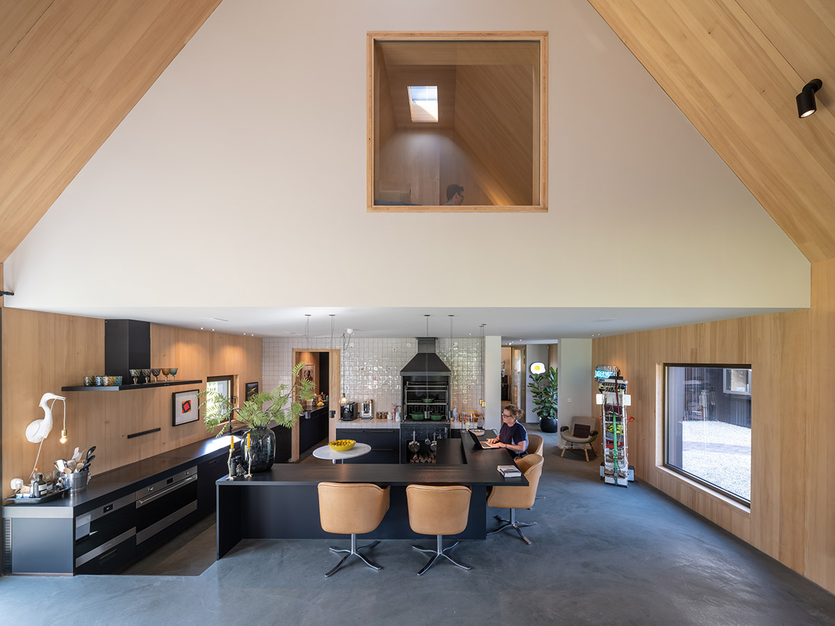 Mecanoo completes Villa Vught with dark bronze cladding inspired by traditional Dutch farmhouses