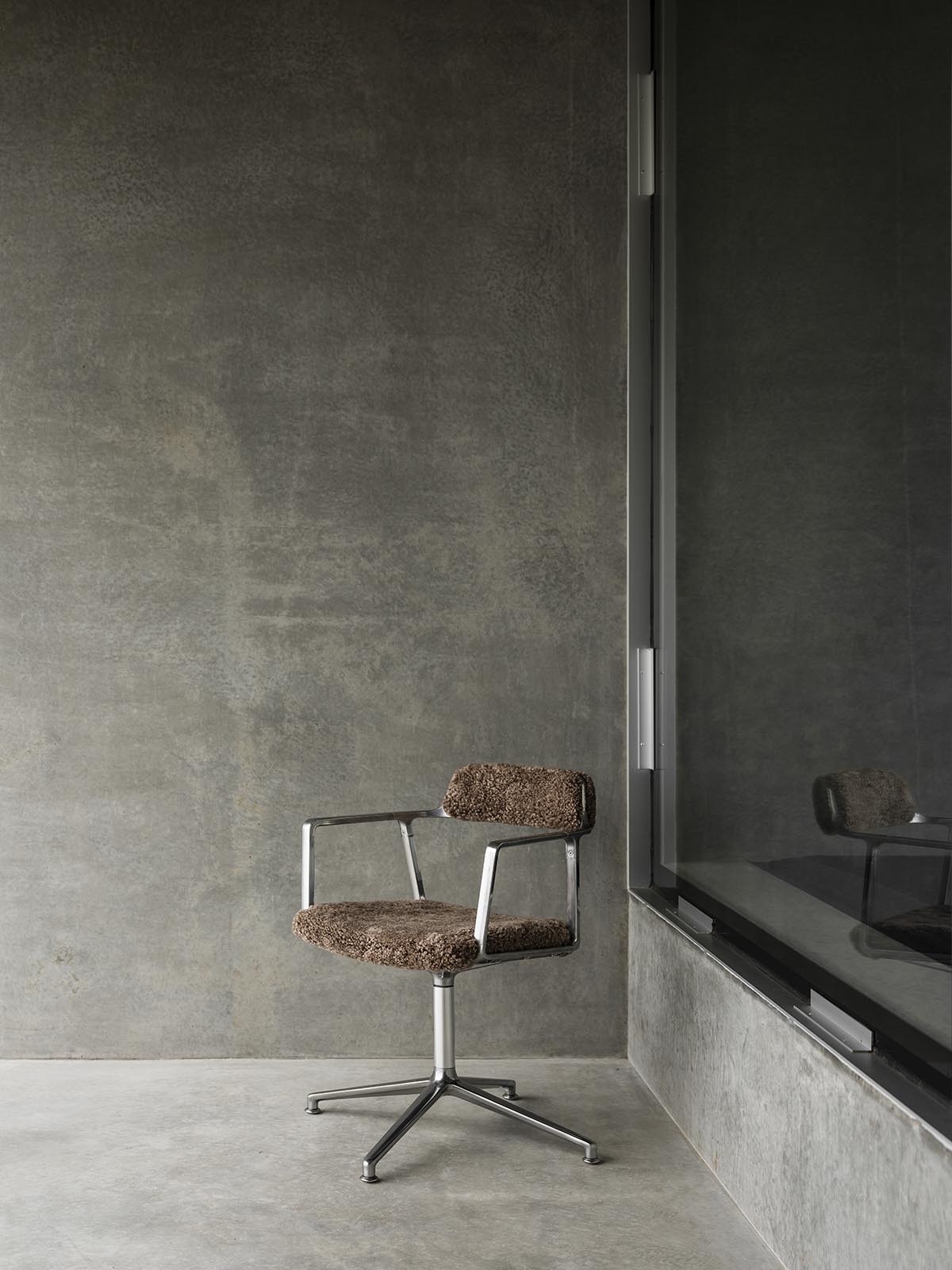 A linear, concrete tunnelled guest house by Room11 architects extends to Tasmania’s bushlands