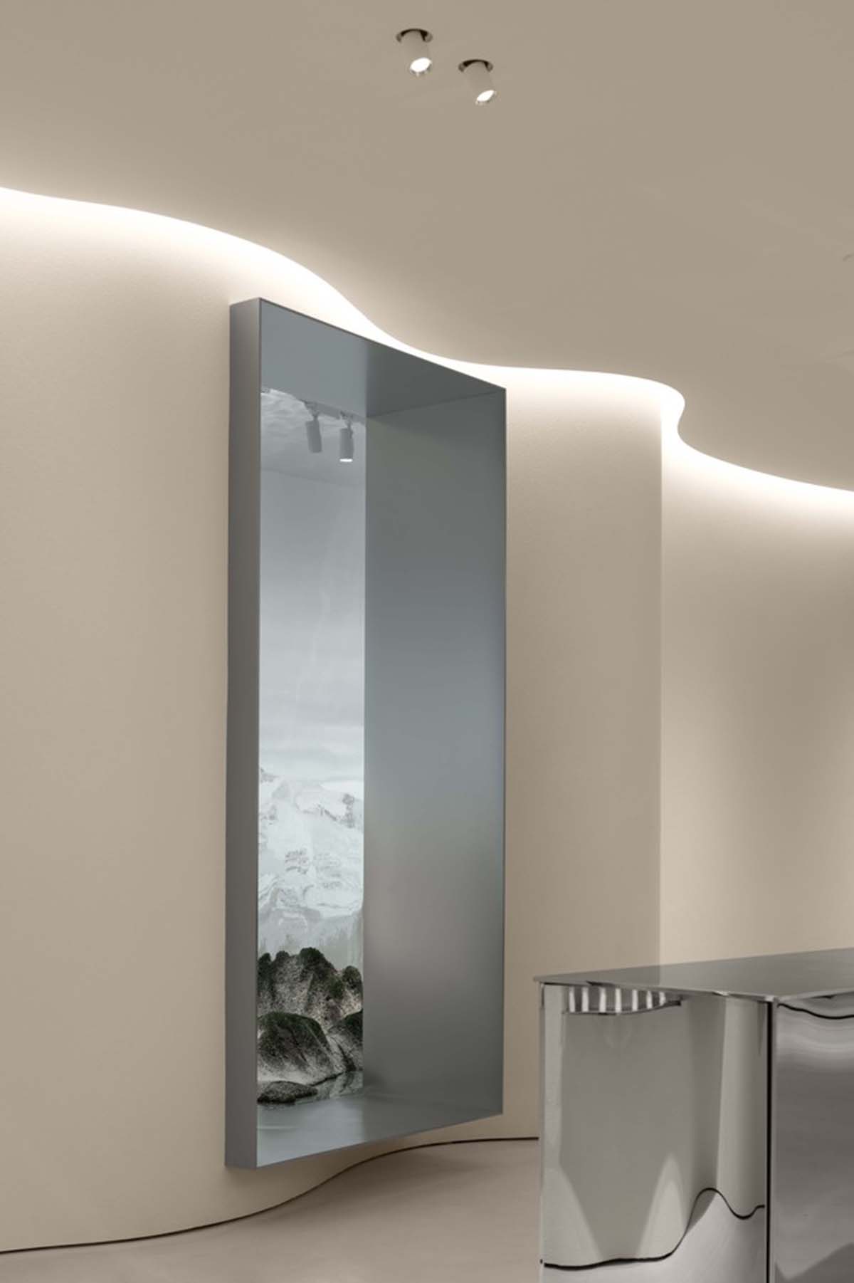F.O.G. Architecture creates cave-like interiors with mirrored surfaces for aromatherapy store