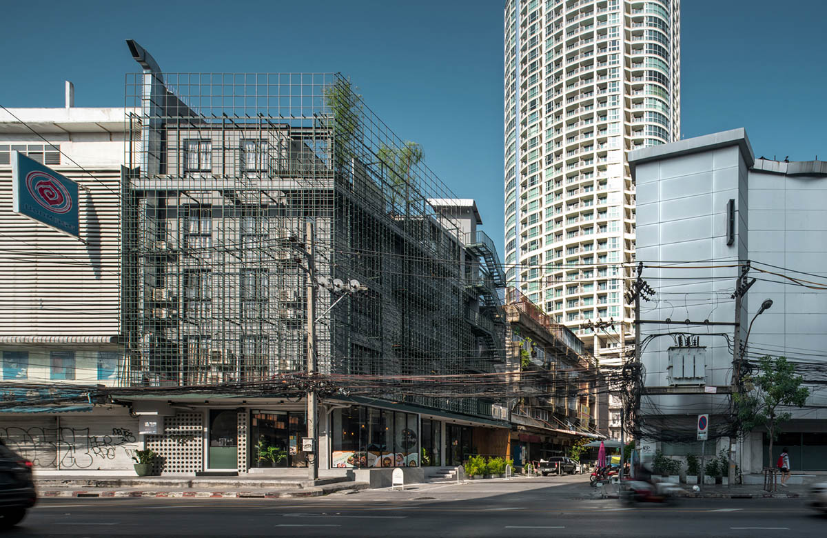SIM Studio converts old shophouse into a boutique hotel by wrapping with steel exoskeleton in Bangkok