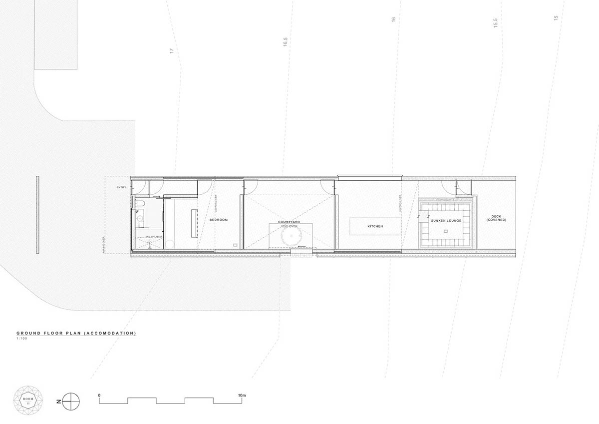 A linear, concrete tunnelled guest house by Room11 architects extends to Tasmania’s bushlands